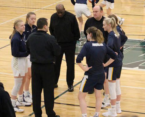 Lexie and Elayne talk to the referees and Raymond Central captains before the game. 